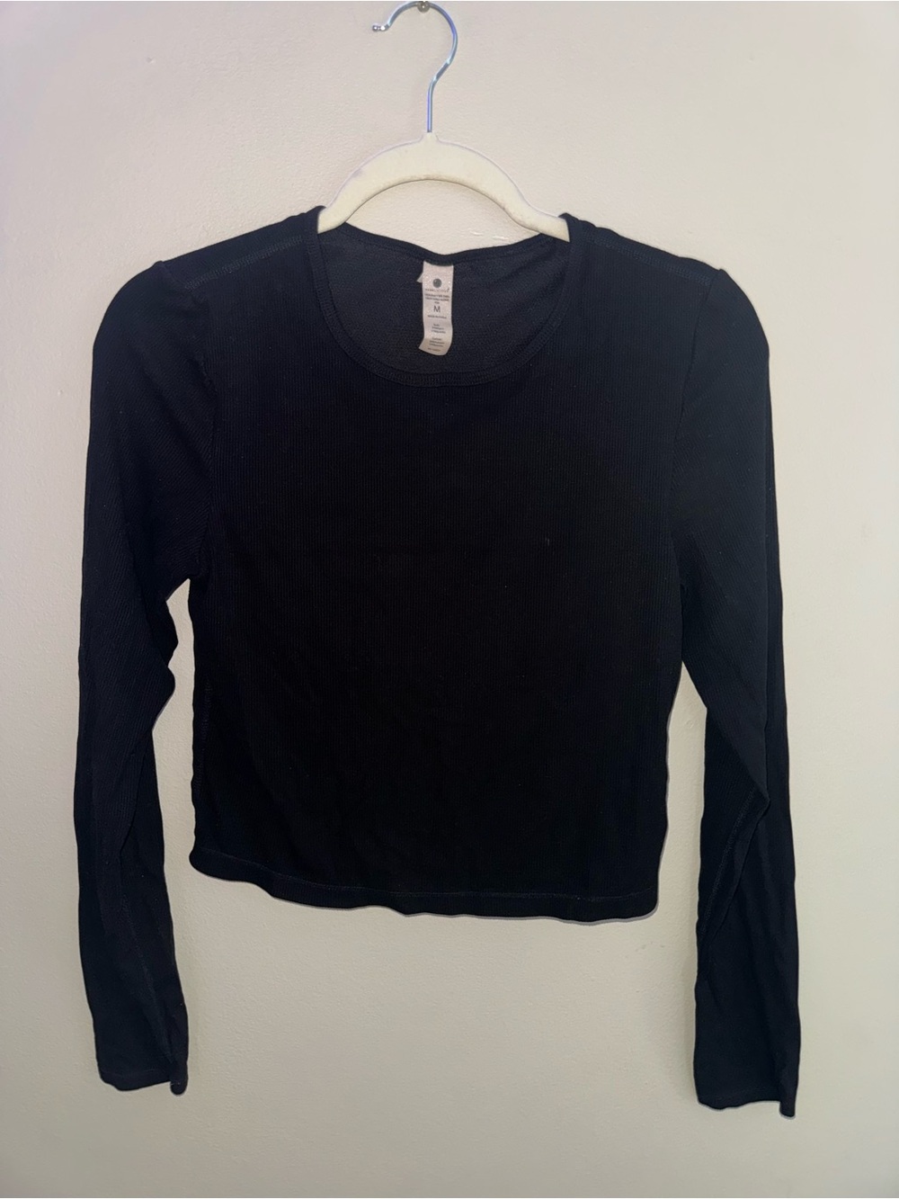 Like new, Yogalicious, black ribbed long sleeve top, size medium